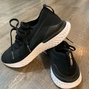 Nike Epic React Flyknit Women's
7-7.5 US Size Black / White - narrow